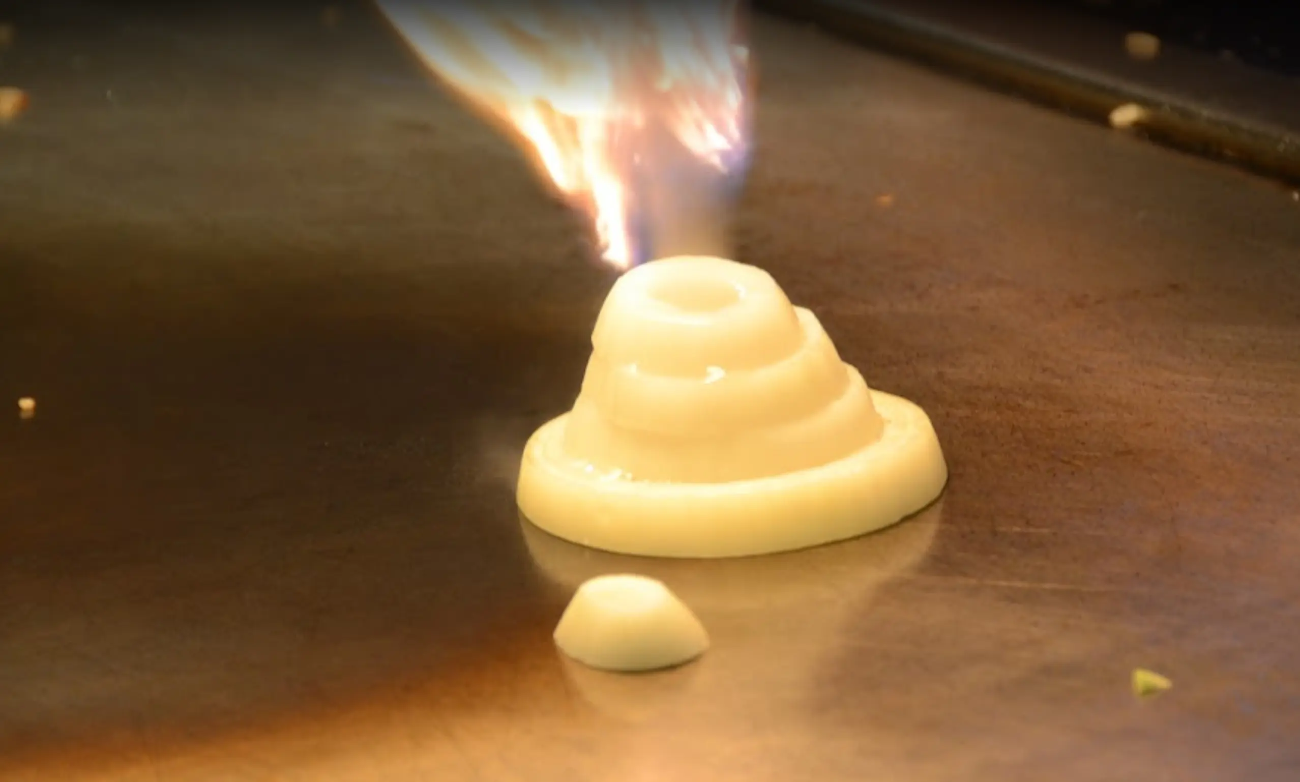 Onion volcano on fire on a grill