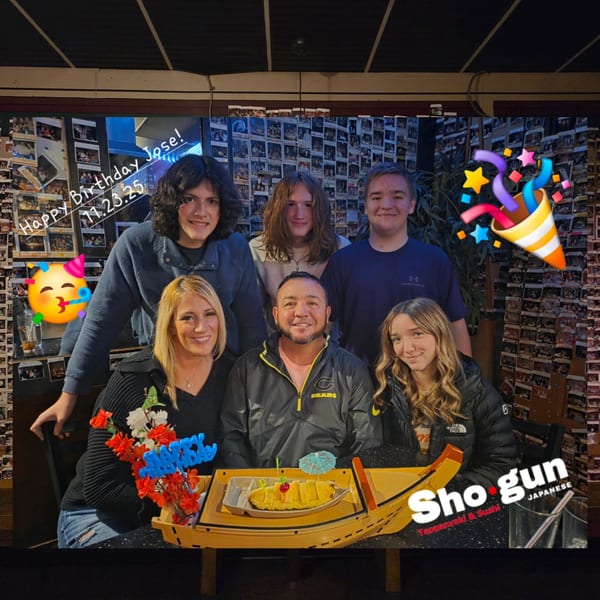 A family celebrates a birthday at Shogun Japanese Steakhouse, with a dessert boat and festive emojis.